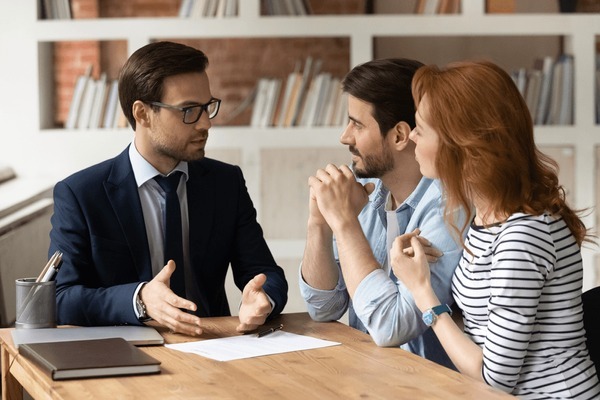Professional consultant discussing financial plans with a client